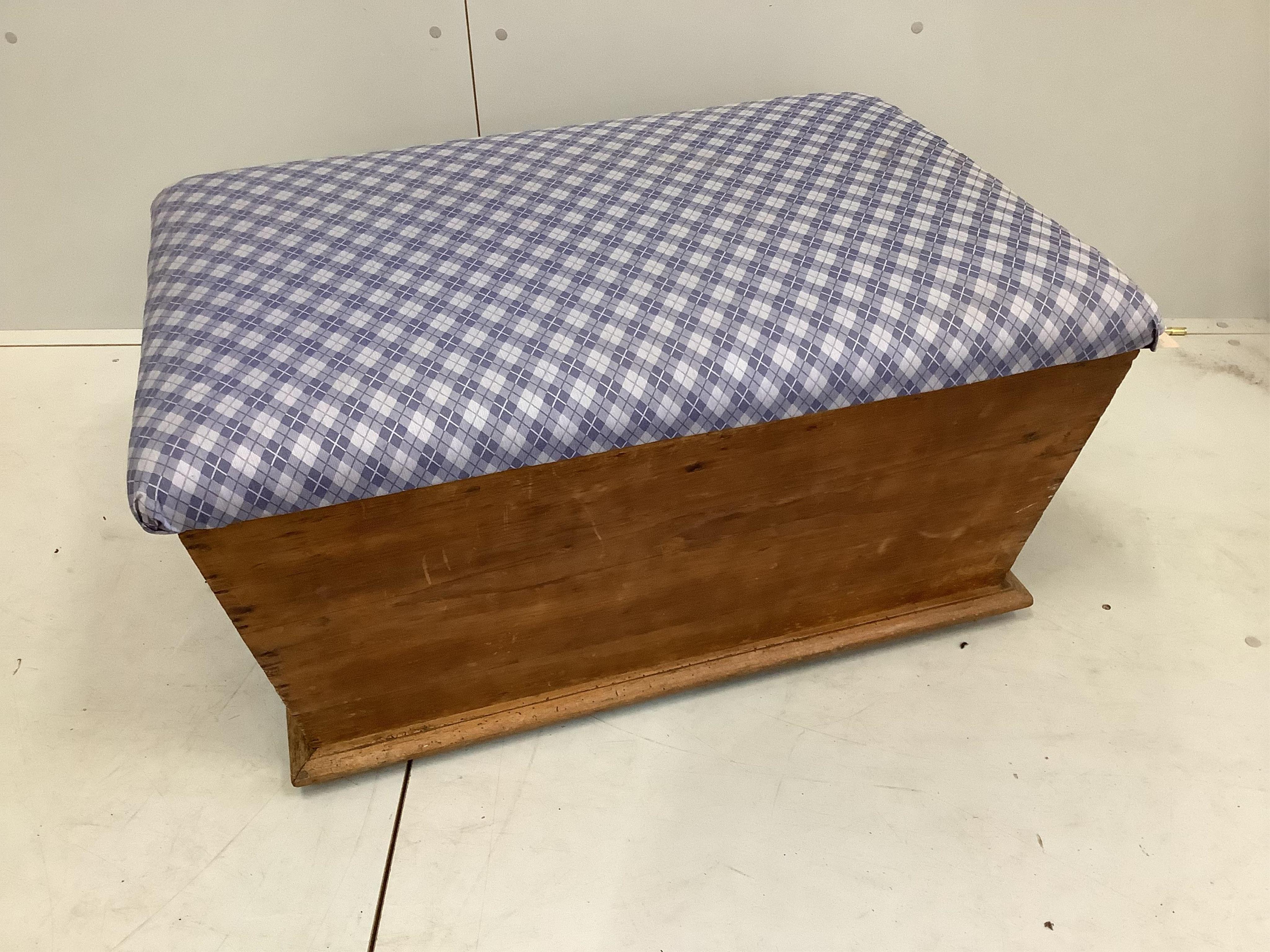 A Victorian pine ottoman with upholstered hinged seat, width 88cm, depth 56cm, height 42cm